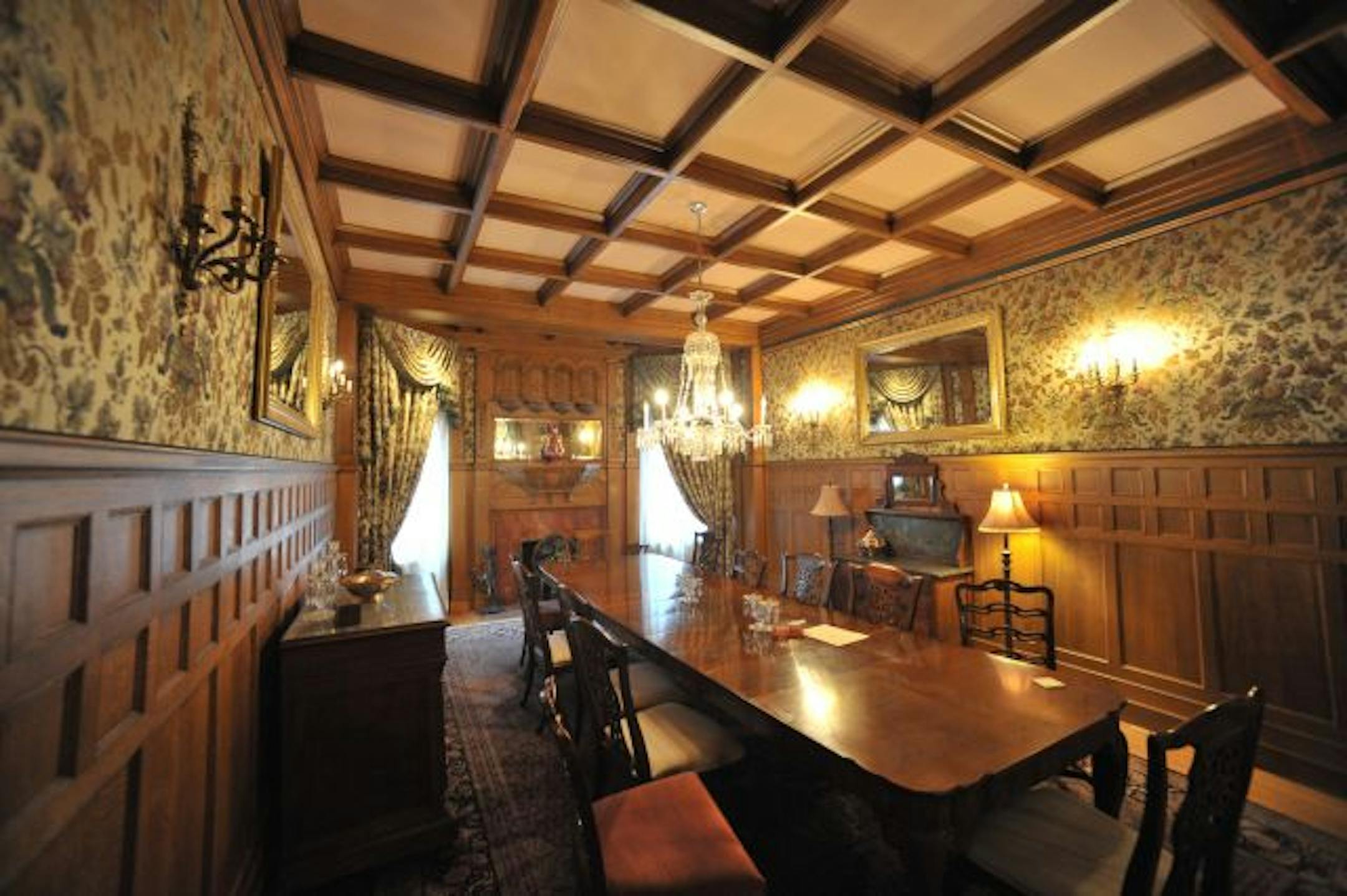 The government seized the building from an investment group led by money manager Trevor Cook and his associates who allegedly defrauded more than 1,200 investors out of $191 million. Real estate agents told a judge Thursday that the 117-year-old mansion in Minneapolis, which resembles a Gothic castle with its thick, pink limestone walls, should be listed at just under $2 million and could take a long time to sell.