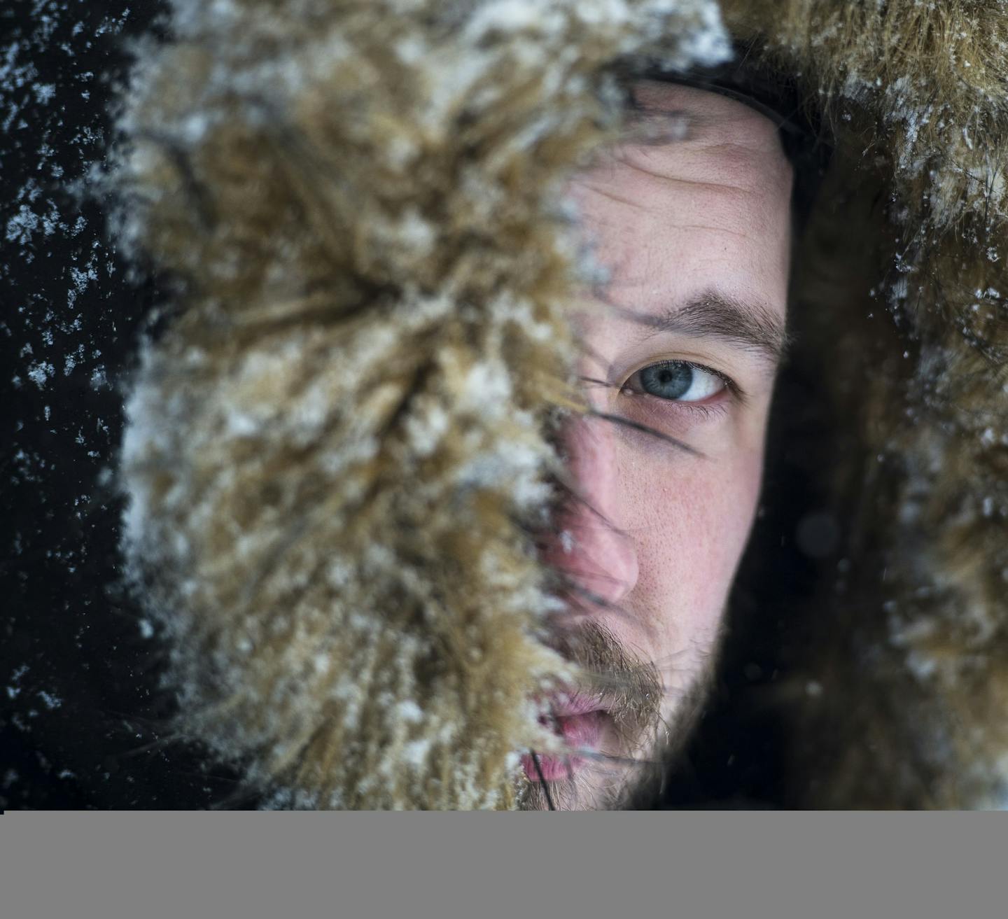 Joseph Reno, bundled up and covered in snow, was photographed in a portrait while walking along Lydnale Avenue South for a trip to Cub Uptown Tuesday afternoon. ] (AARON LAVINSKY/STAR TRIBUNE) aaron.lavinsky@startribune.com Snow features photographed Tuesday, Feb. 2, 2016 in Minneapolis, Minn.