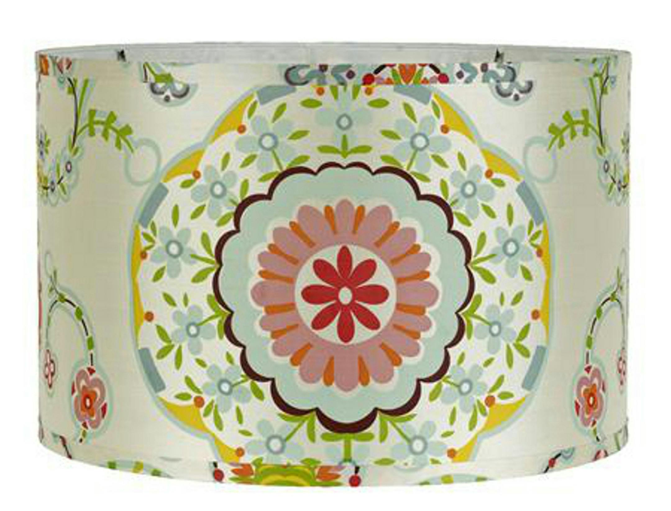 The pattern is called Carnival Wonderland, but the handpainted drum shade has the vibe of a pastel ethnic Suzani. It's 16 inches and $125 at Shades of Light, www.shadesoflight.com. (Shades of Light)