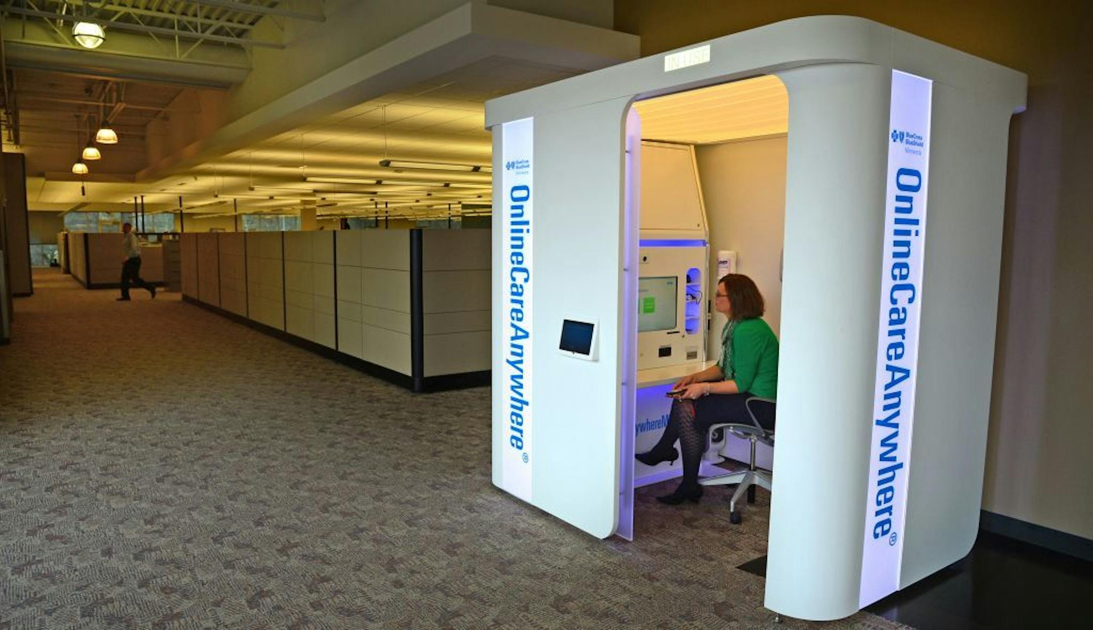 Laura Kaslow received a call from Dr. Sandy Wiita at the Blue Cross Blue Shield Minnesota headquarters in Eagan, Minn., demonstrating the equipment for video consultations with doctors.