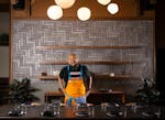 Chef Yia Vang poses for a portrait in his new restaurant Vinai in Minneapolis a week before it opens to the public.