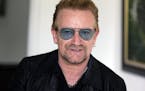 Irish rock star Bono speaks during an interview with the Associated Press in Lagos, Nigeria Friday, Aug. 28, 2015, African stars and rock star Bono sa