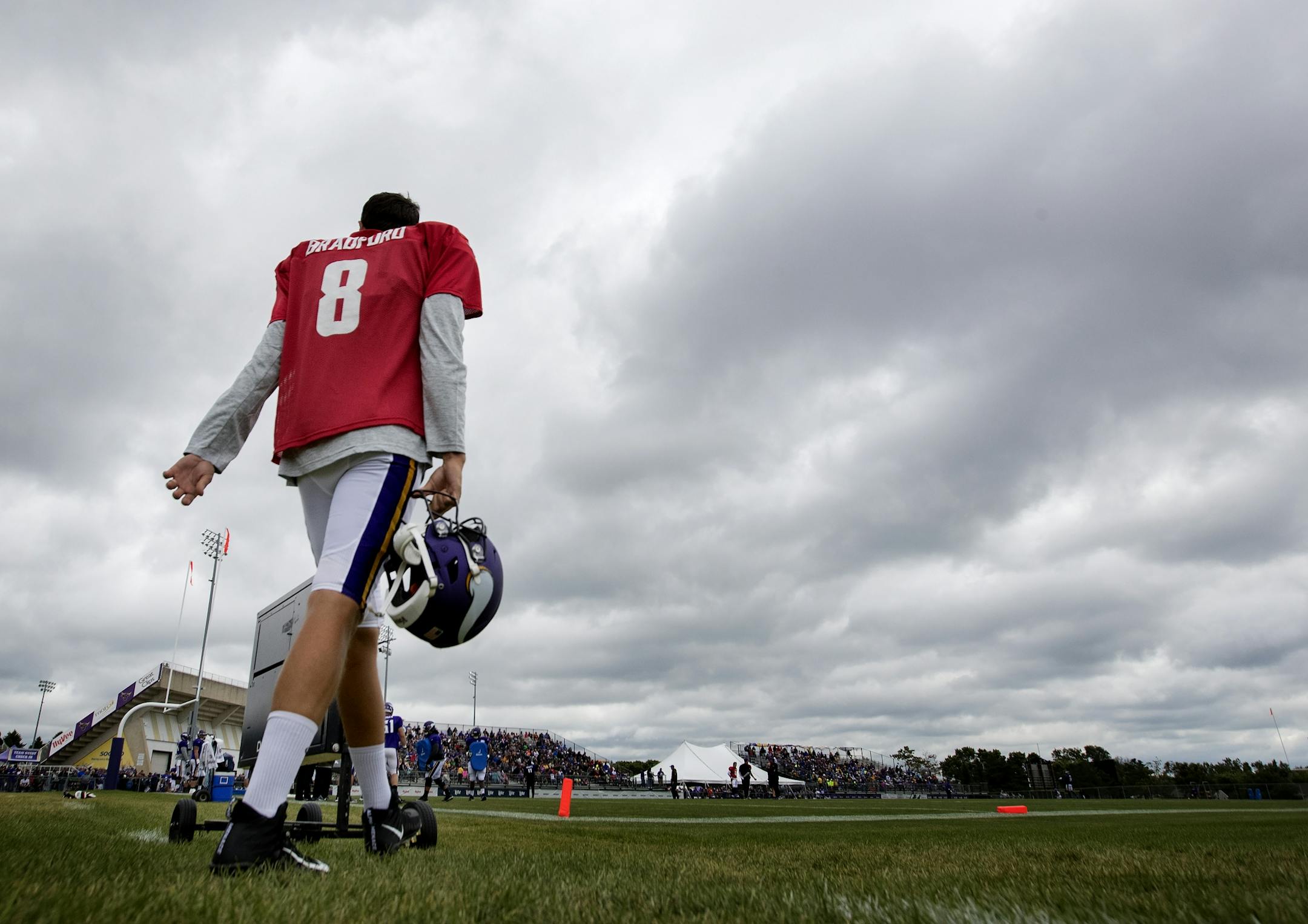 Minnesota Vikings quarterback Sam Bradford (8) walked on the field for the afternoon practice.