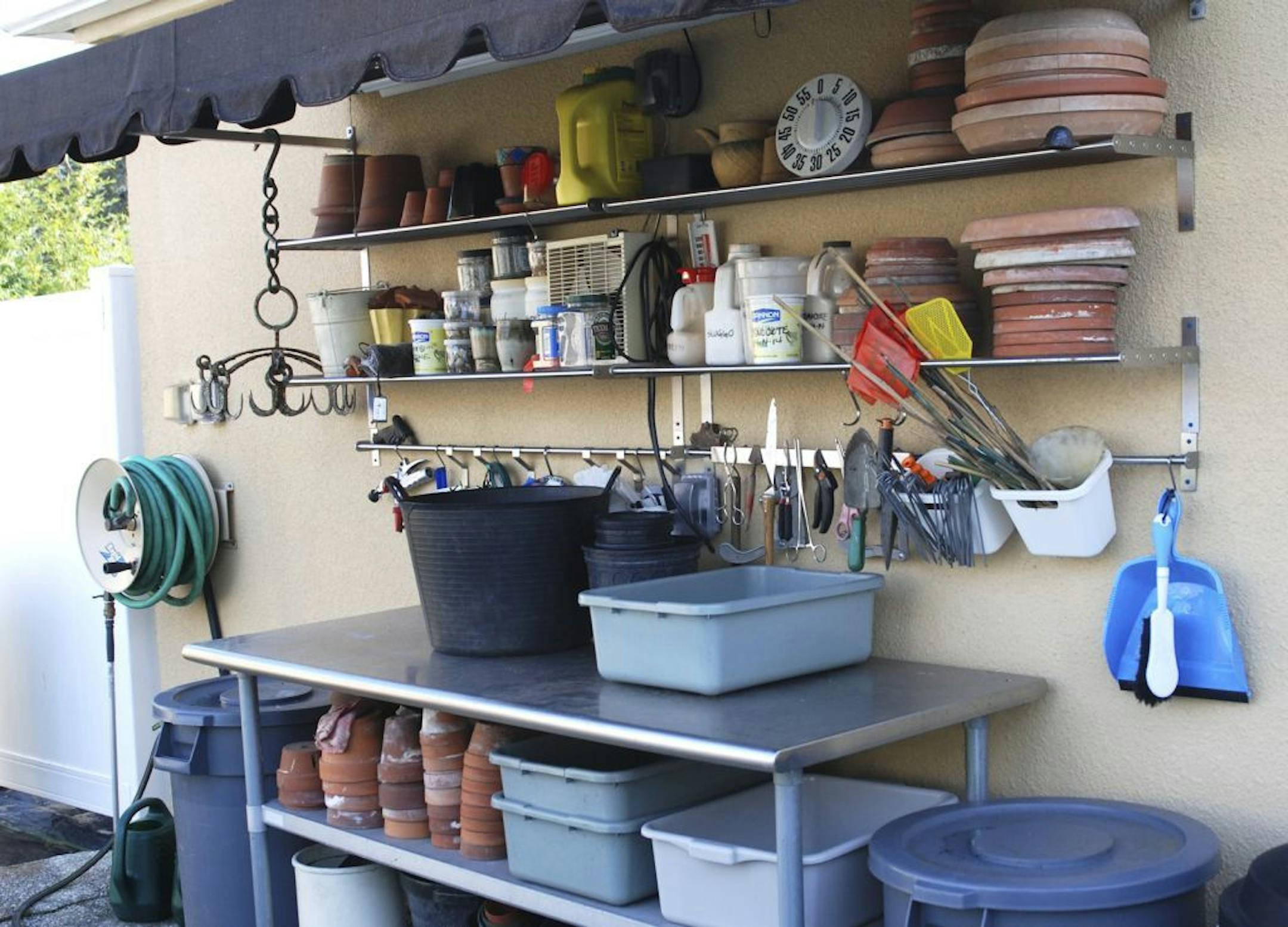 SH12J007GARDENER Oct. 1, 2012 -- When every tool has a home it's much easier to replace it when you're done working and to find it next time it's needed.