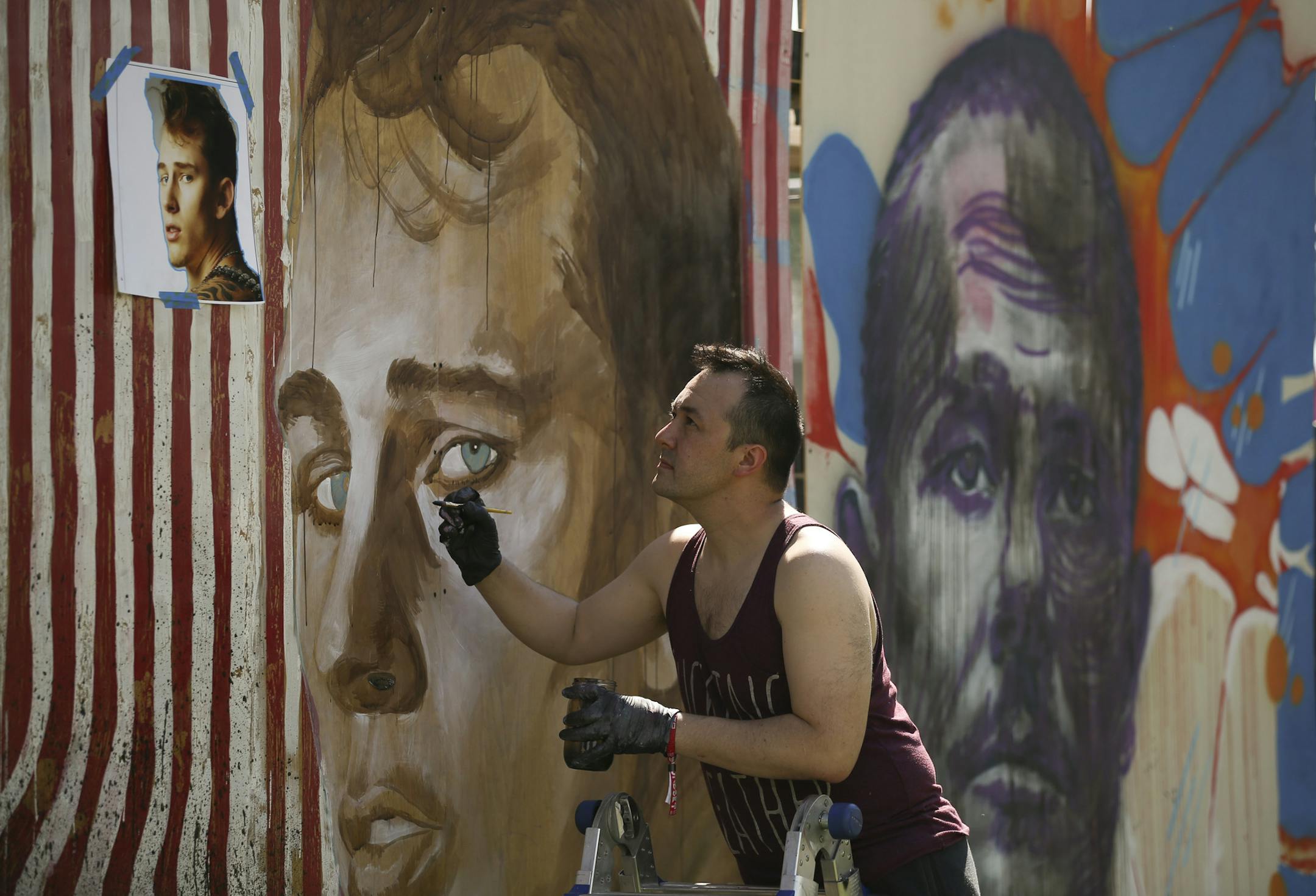 Wes Winship painted artists live as they performed Soundset 2016 on Sunday. He finished up Machine Gun Kelly during his set. ] JEFF WHEELER ï jeff.wheeler@startribune.com The ninth annual Soundset hip-hop festival took place in its new location at the Minnesota State Fairgrounds Sunday, May 29, 2016 in Falcon Heights.