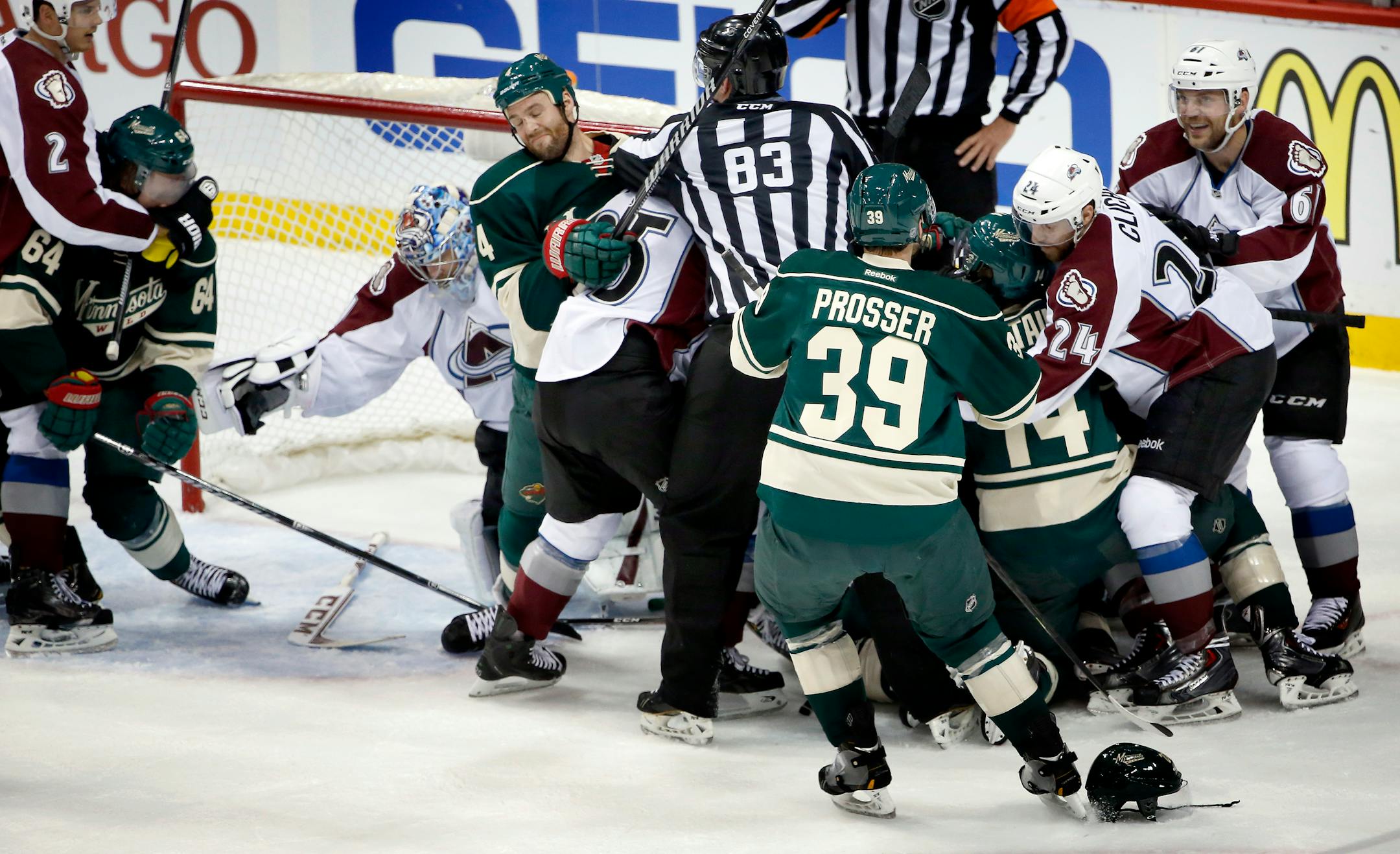 Minnesota Wild and Colorado Avalanche players had to be separated by referee after a play in the first period.