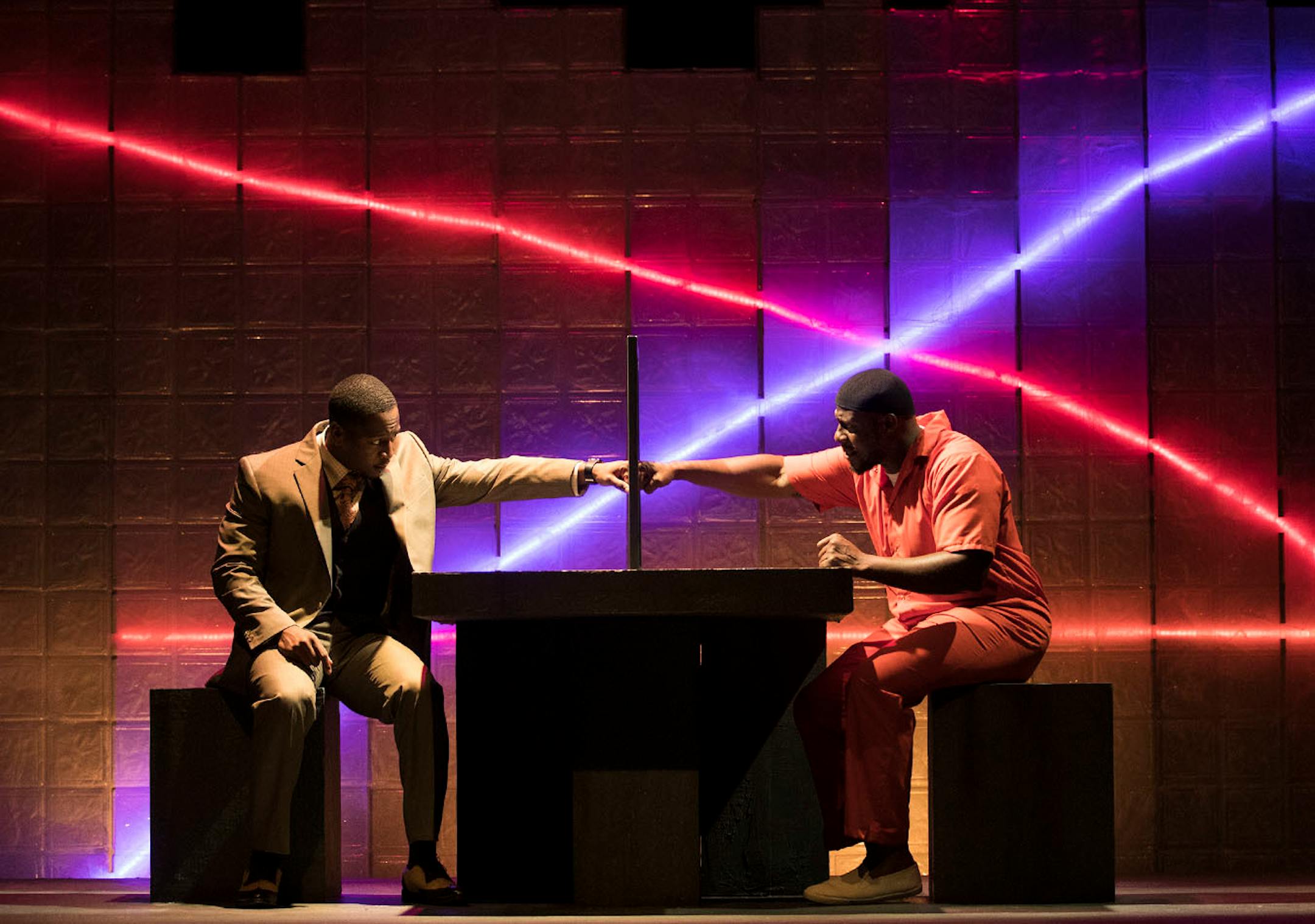 Ansa Akyea, right, as "Bilal" and Darius Dotch as "Eric" rehearsed the play "Bars and Measures" at the Jungle Theater.