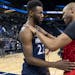Minnesota Timberwolves Andrew Wiggins (22) spoke with Vince Carter (15) of the Atlanta Hawks at the end of the game.