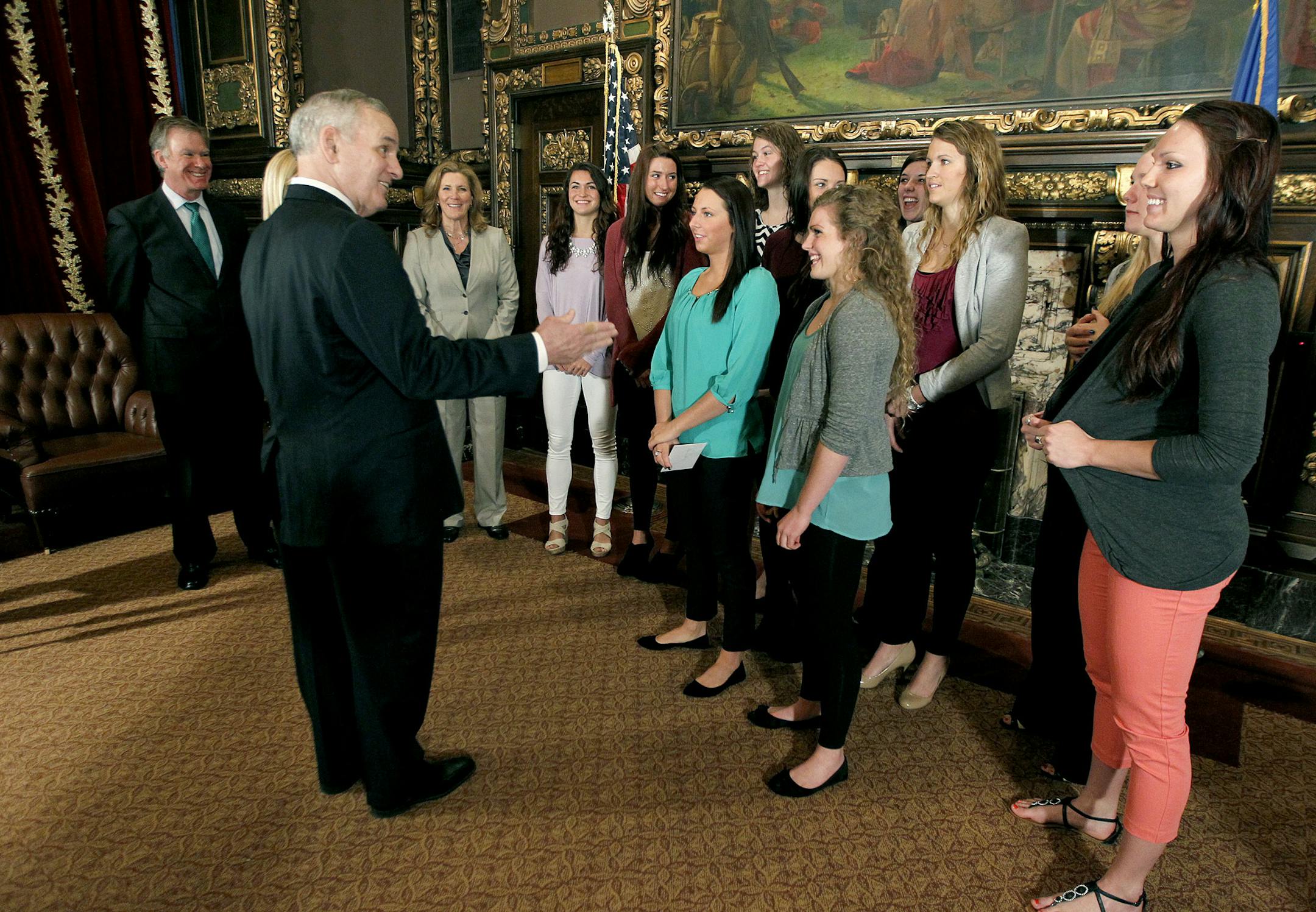 Governor Mark Dayton and St. Paul Mayor Chris Coleman, left, teamed up for a team photo of the Concordia Women's Volleyball team, Thursday, April 24, 2014 at the State Capitol in St. Paul, MN. ] (ELIZABETH FLORES/STAR TRIBUNE) ELIZABETH FLORES • eflores@startribune.com