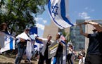 Supporters of Israel demonstrate at George Washington University where pro-Palestinian students protest over the Israel-Hamas war, Thursday, May 2, 20