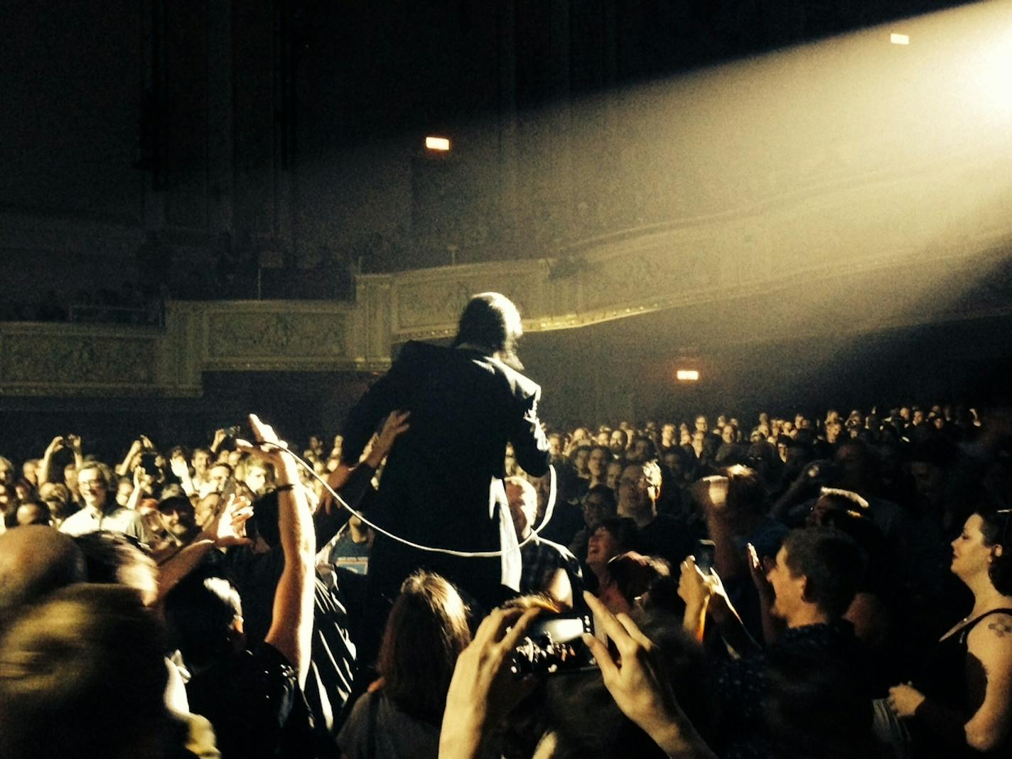 Nick Cave got to know Saturday's State Theatre crowd during the third song "Tupelo" and again in the pre-encore finale "Push the Sky Away."