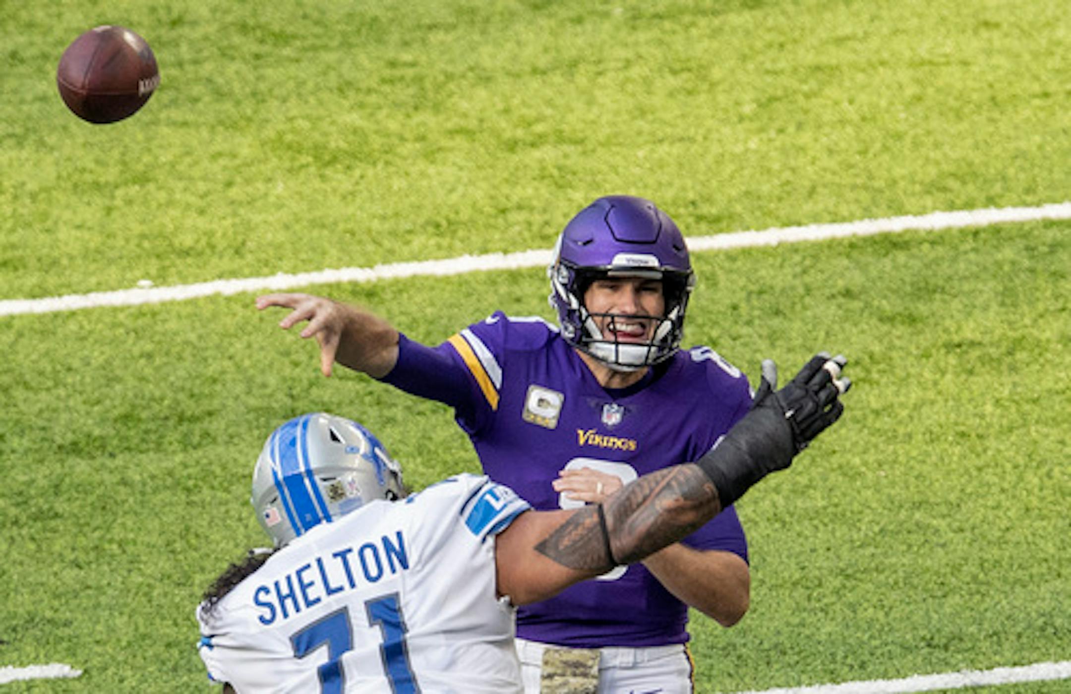 Minnesota Vikings quarterback Kirk Cousins (8) attempted a pass in the first quarter.