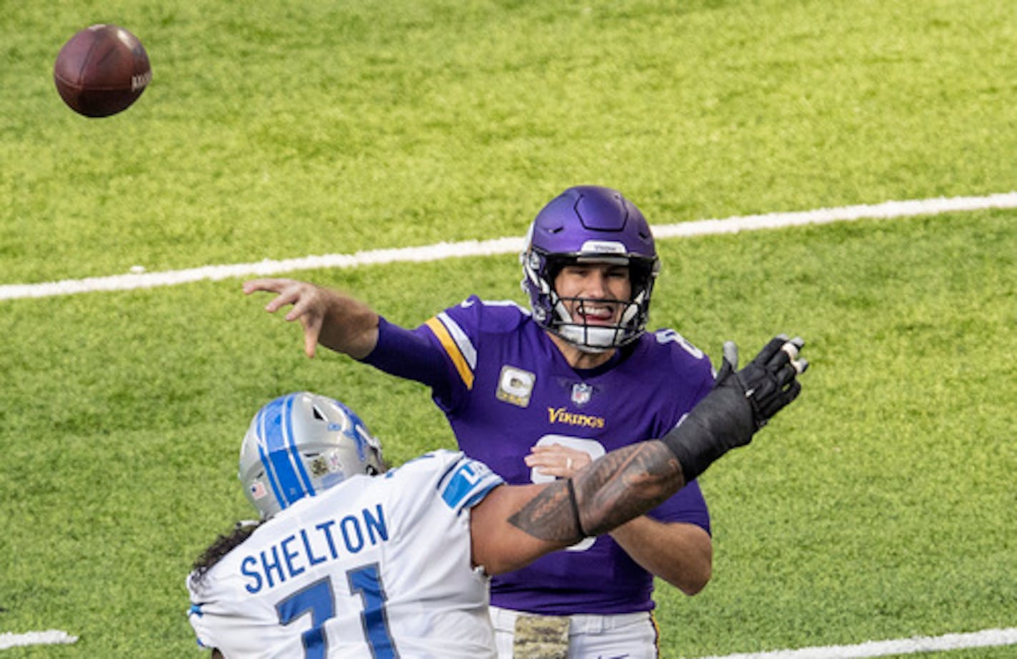 Minnesota Vikings quarterback Kirk Cousins (8) attempted a pass in the first quarter.