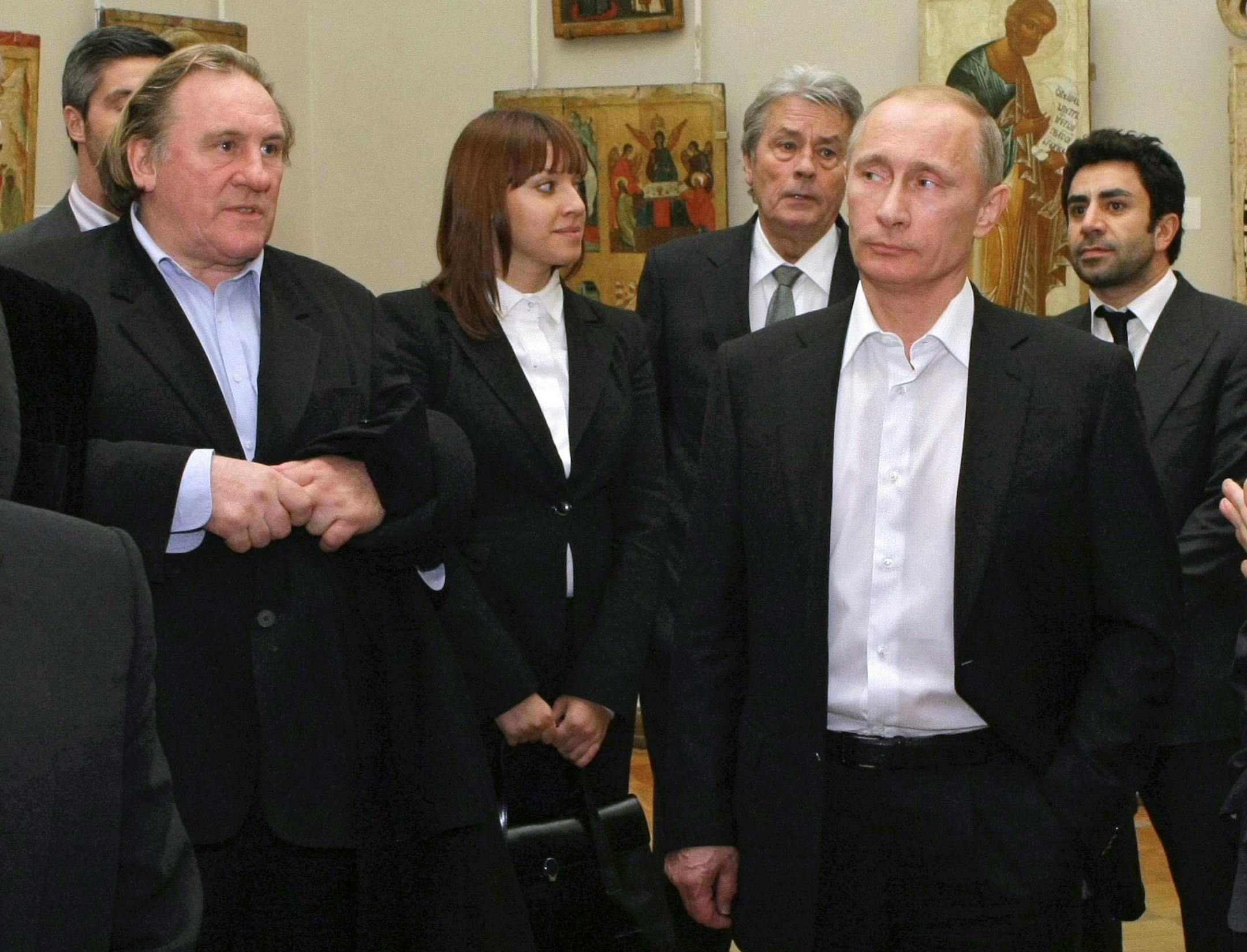 FILE - In this Saturday, Dec. 11, 2010 file photo Russian Prime Minister Vladimir Putin, right, and French actor Gerard Depardieu, left, attend the Russian Museum, in St. Petersburg. Gerard Depardieu, the French actor who has been sparring with his native country over taxes, has been granted Russian citizenship. A brief announcement on the Kremlin website said President Vladimir Putin signed the citizenship grant on Thursday Jan. 3, 2013.