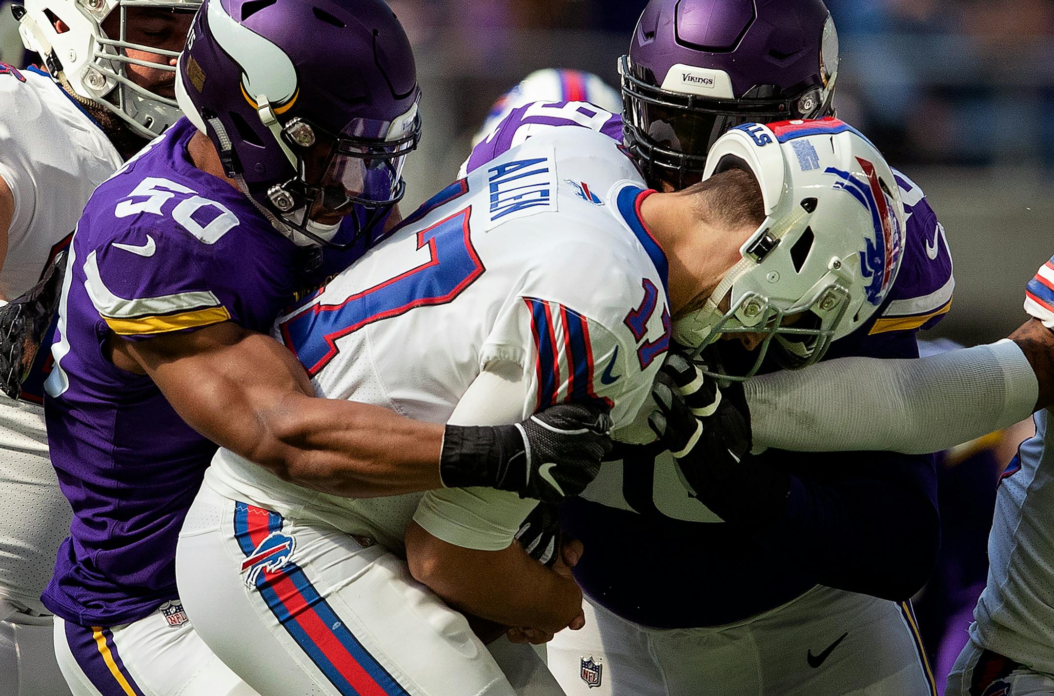Eric Wilson (50) wrapped up Bills quarterback Josh Allen (17) for an apparent sack but Linval Joseph (98) was called for a personal foul on the play. ] CARLOS GONZALEZ ï cgonzalez@startribune.com ñ September 23, 2018, Minneapolis, MN, US Bank Stadium, NFL, Minnesota Vikings vs Buffalo Bills