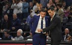 Wolves offensive coordinator Pablo Prigioni, right, and head coach Ryan Saunders conferred during a fourth quarter timeout. ] JEFF WHEELER &#x2022; Je