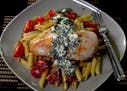 Golden brown chicken breasts top pasta with a goat cheese vinaigrette. (Diedra Laird/Charlotte Observer/TNS) ORG XMIT: 1197295