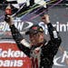 Sprint Cup Series driver Greg Biffle celebrates his win in the NASCAR Quicken Loans 400 auto race at Michigan International Speedway, Sunday, June 16,