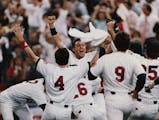 Minnesota Twins celebrate after the final out of the World Series, Oct. 25 1987.