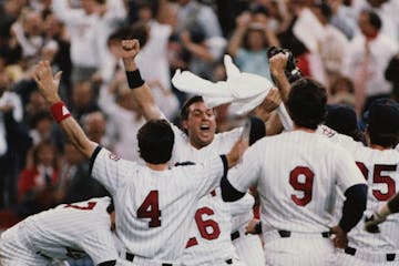 Minnesota Twins celebrate after the final out of the World Series, Oct. 25 1987.