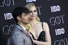 FILE - In this April 3, 2019 file photo, Joe Jonas, left, and Sophie Turner attend HBO's "Game of Thrones" final season premiere at Radio City Music H