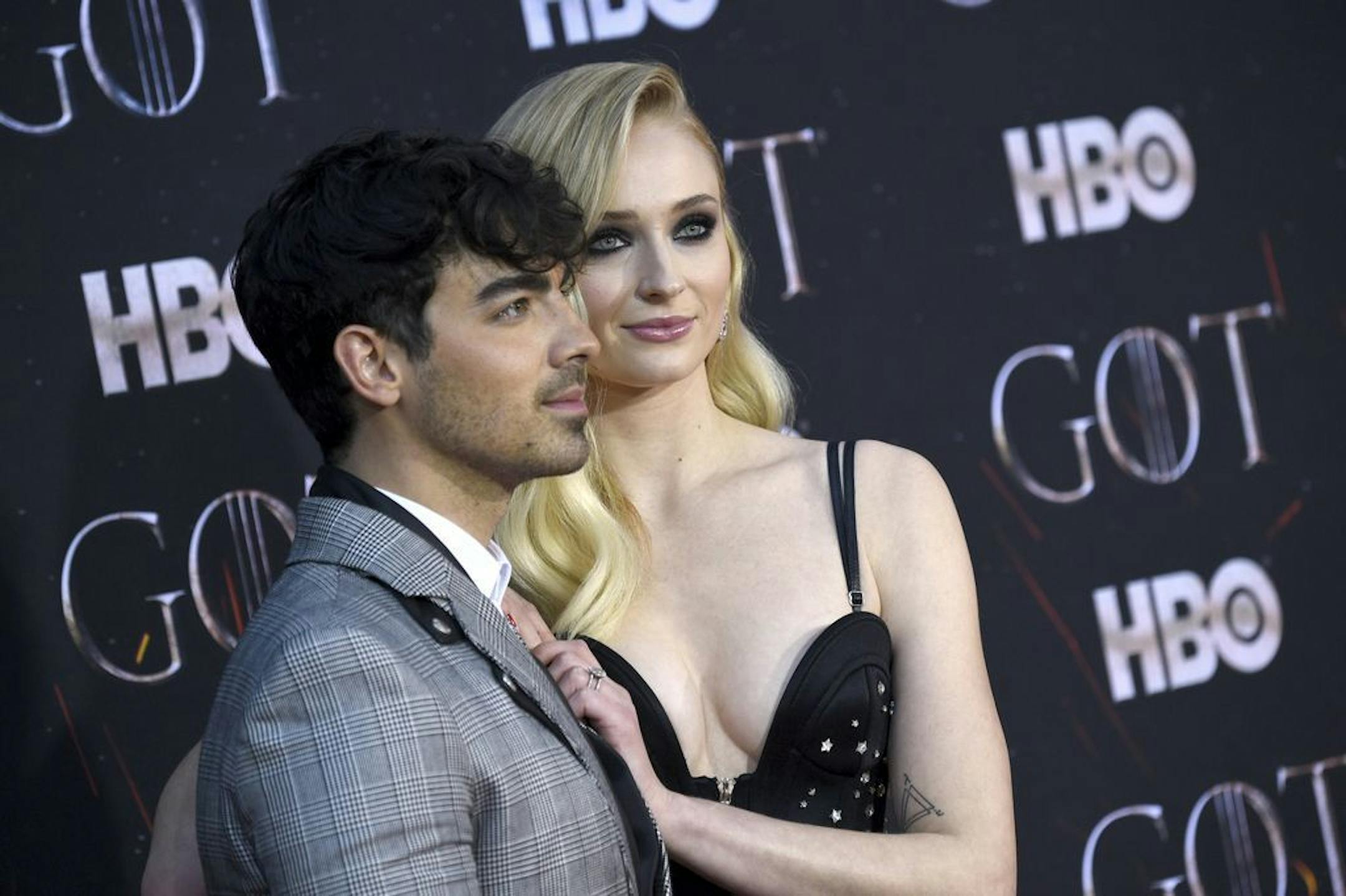 FILE - In this April 3, 2019 file photo, Joe Jonas, left, and Sophie Turner attend HBO's "Game of Thrones" final season premiere at Radio City Music Hall in New York. The couple have gotten married in a surprise ceremony in Las Vegas. It happened Wednesday night, May 1 after the Billboard Music Awards, where the Jonas Brothers had performed. Turner's publicist confirmed the nuptials, which DJ Diplo posted on his Instagram live feed.