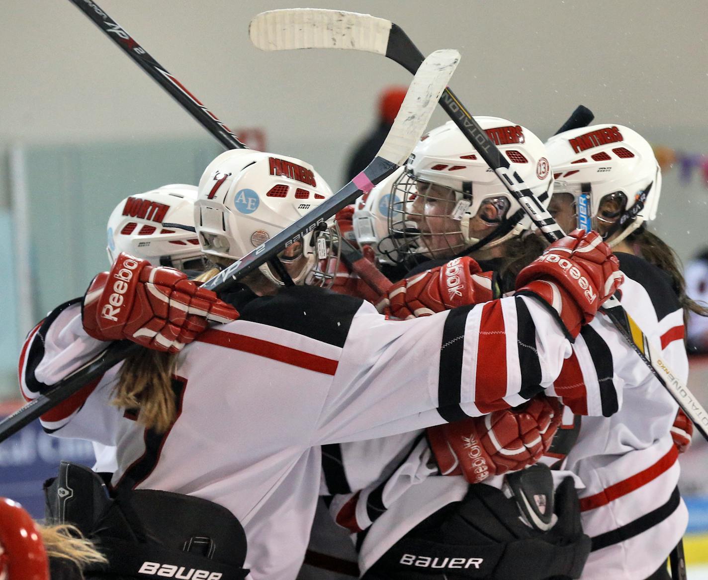 Lakeville North girls' hockey players celebrated a Taylor Flajerty goal against Burnsville last month.