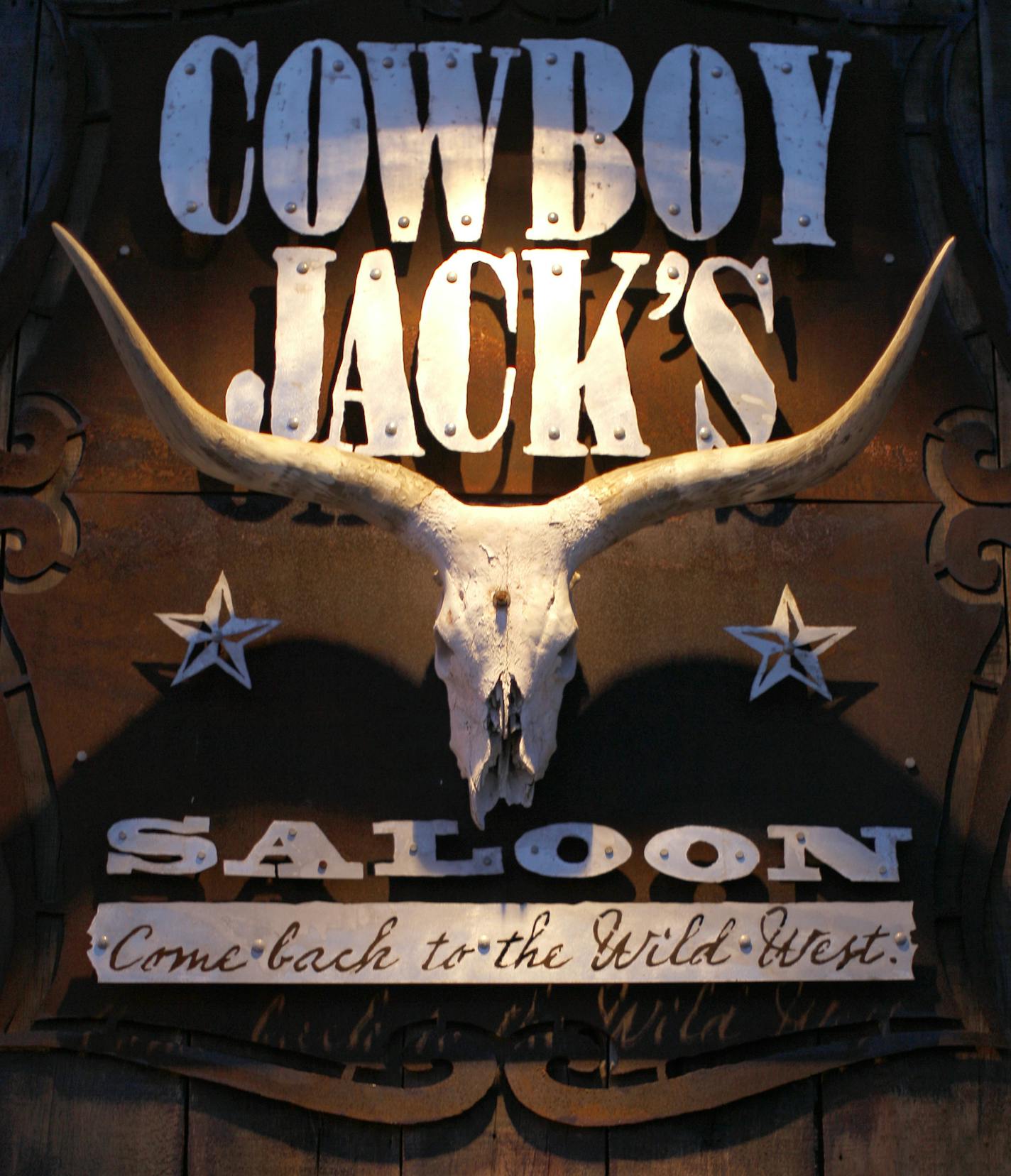 TOM WALLACE &#x2022; twallace@startribune.com Assignment #20013369A Slug: cowboy080810 Date: July 23, 2010_ Country-themed bars are on the rise in the Twin Cities. One of the innovators of this particular kind of bar is Chris Diebold's. Cowboy Jack's THIS PHOTO: ] Cowboy Jack&#x2019;s Bar in Plymouth, MN.