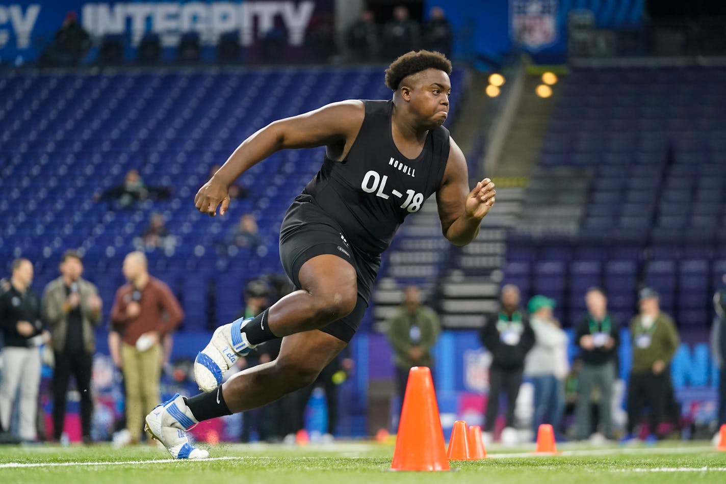 UCLA offensive lineman Jon Gaines II runs a drill at the NFL football scouting combine in Indianapolis, Sunday, March 5, 2023. (AP Photo/Darron Cummings)