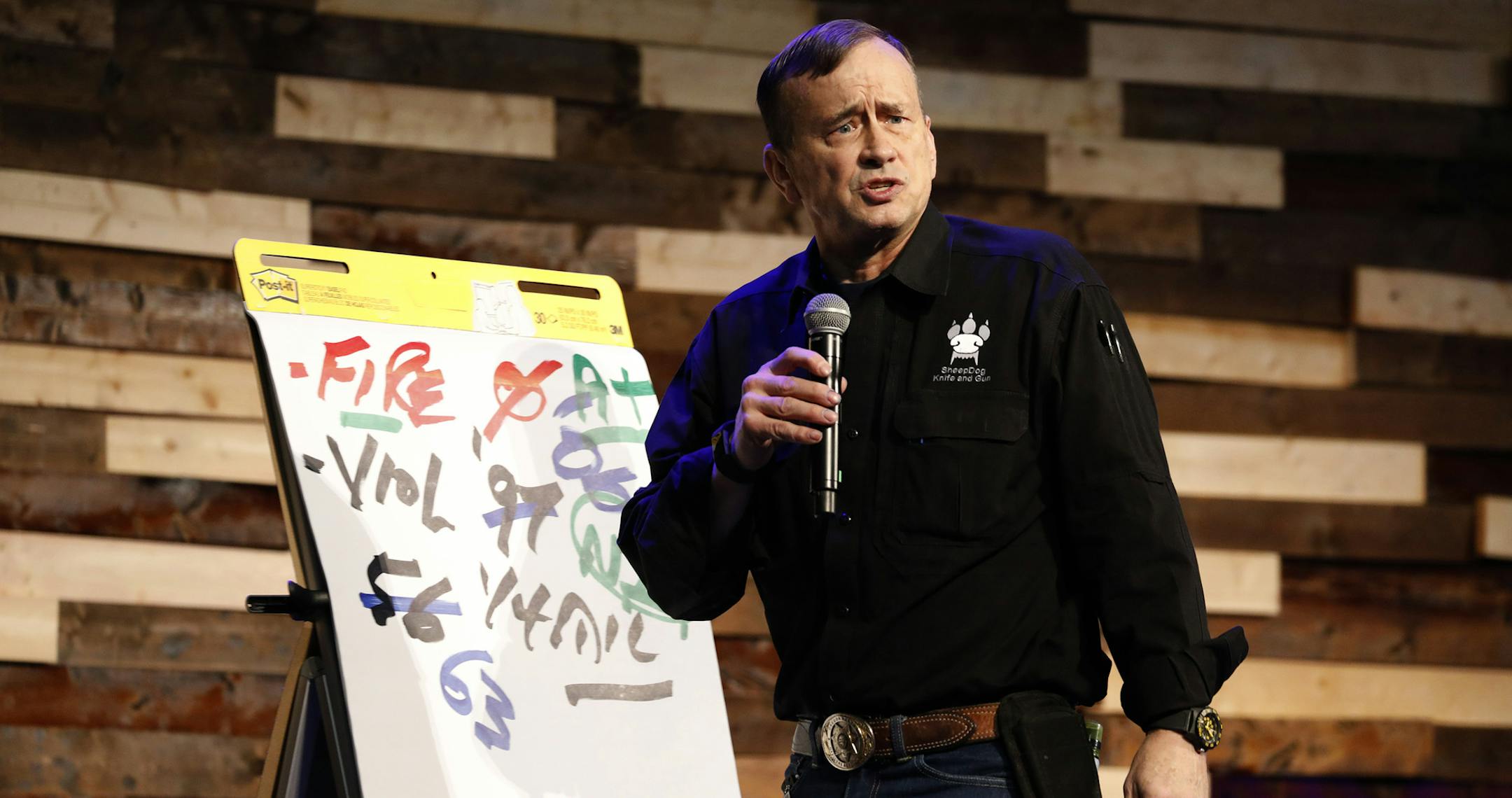 Retired Army Lt. Colonel Dave Grossman speaks at Mariners Church in Huntington Beach, Calif. on May 14, 2018. He was a guest speaker during The California Rifle & Pistol Association as they hosted a seminar, called the Sheepdog Seminar, about church security and safety en light of shootings such as at Sutherland Springs. (Francine Orr/Los Angeles Times/TNS) ORG XMIT: 1231790