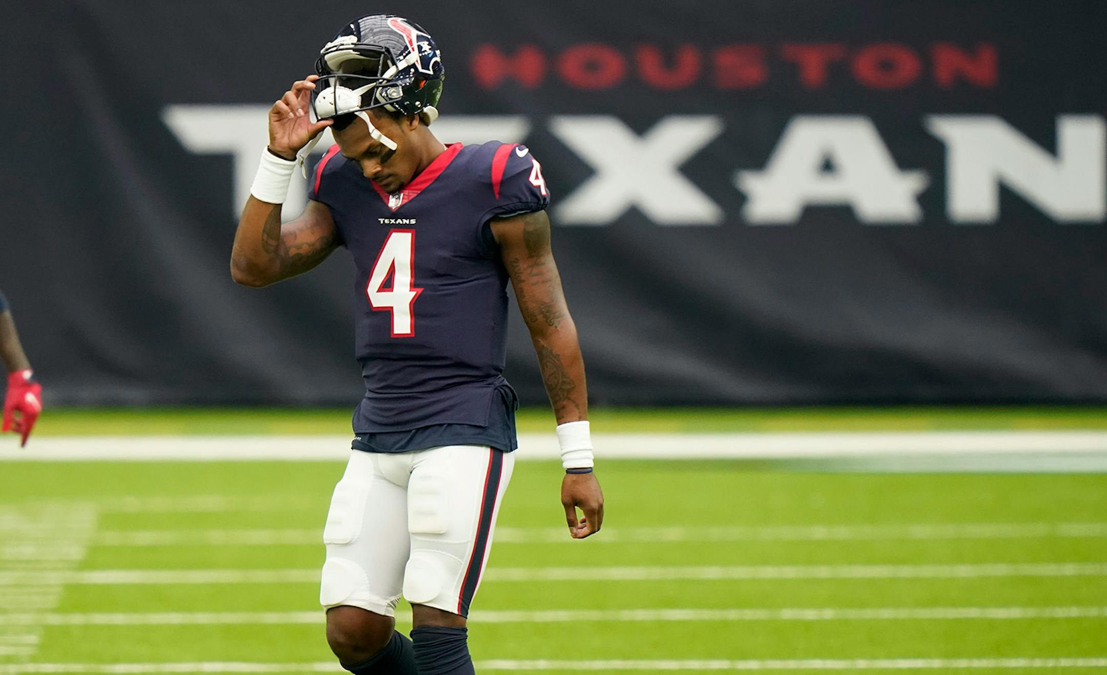 Houston Texans quarterback Deshaun Watson (4) walks off of the field during the first half of an NFL football game against the Minnesota Vikings, Sunday, Oct. 4, 2020, in Houston. (AP Photo/David J. Phillip)