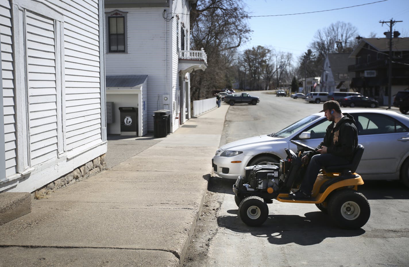 A man drove up on a lawn mower at The General Store in Marine on St. Croix, Minn., on Friday, March 27, 2015. ] RENEE JONES SCHNEIDER &#x2022; reneejones@startribune.com NO ID sorry!