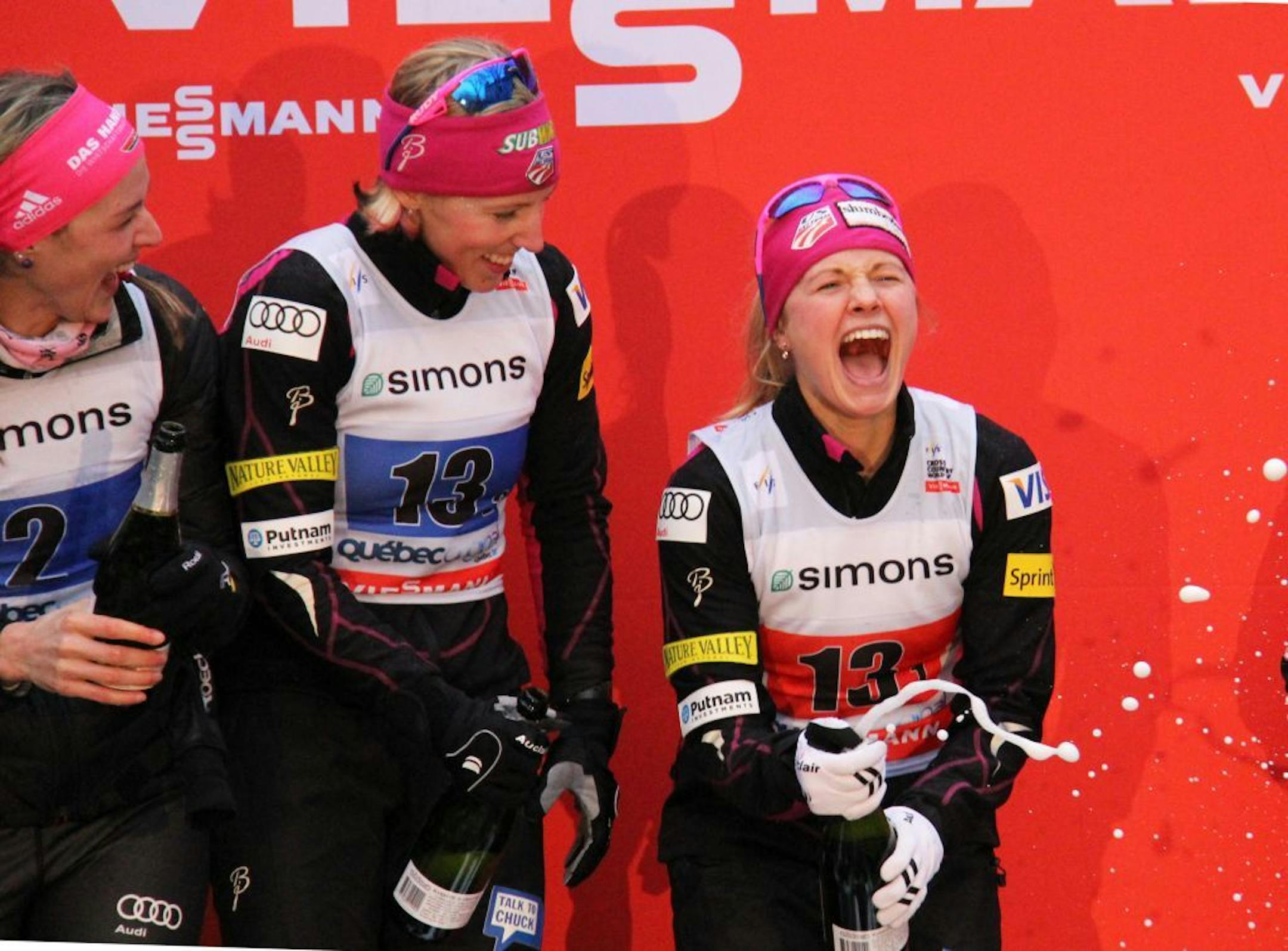 Jessie Diggins leads the celebration with Kikkan Randall as the U.S. Ski Team duo picked up an historic win in Quebec City.