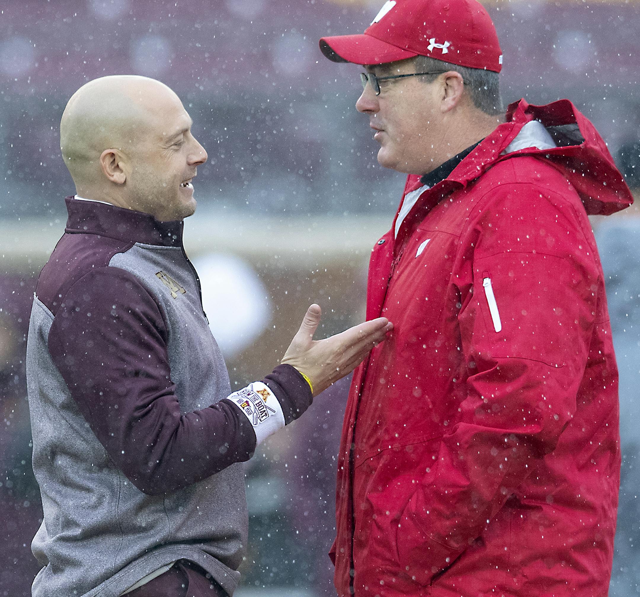 Minnesota Gophers Head Coach P. J. Fleck greeted Wisconsin Head Coach Paul Christ on the field before the game. ] ELIZABETH FLORES • liz.flores@startribune.com Minnesota Gophers take on the Wisconsin Badgers at TCF Bank Stadium, Saturday, November 30, 2019 in Minneapolis, MN.