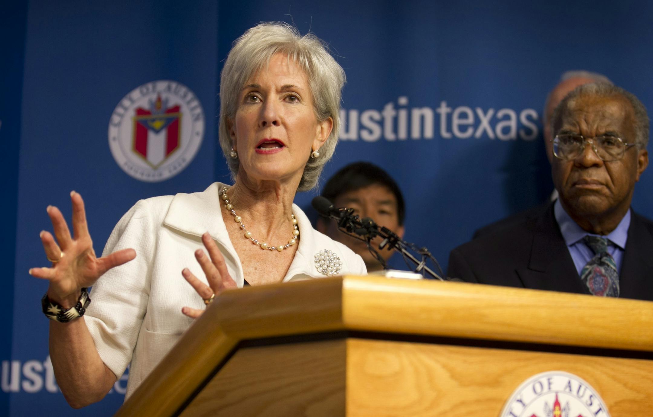 Secretary of Health and Human Services Kathleen Sebelius, left, speaks at a news conference at City Hall in Austin, Texas, on Thursday, Aug. 8, 2013. Sebelius said her office is open to crafting a uniquely Texan plan to make sure everyone has health insurance. She was in Austin and San Antonio to talk about how local communities can take advantage of the Affordable Care Act. Texas has the nationís highest rate of people without health insurance, most of them the working poor and single adul