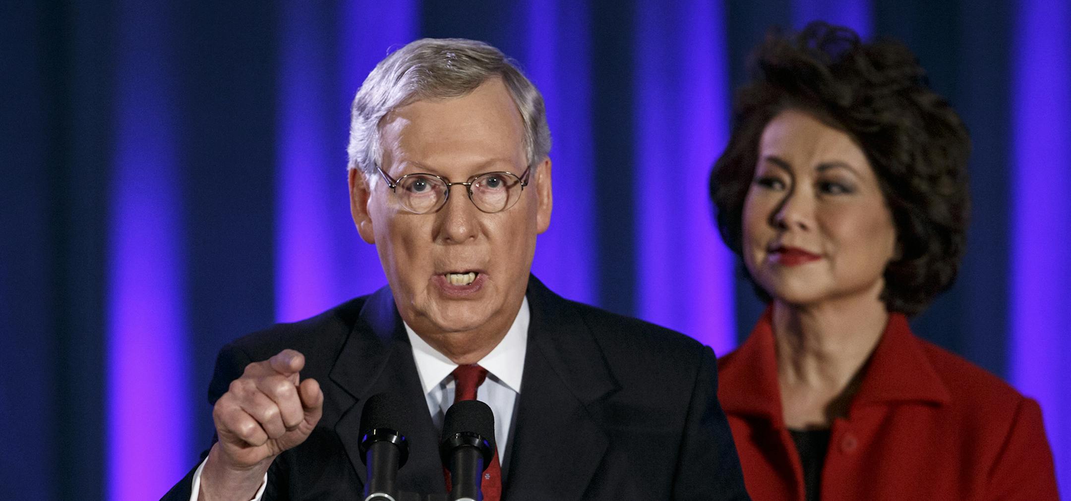 Senate Minority Leader Mitch McConnell of Ky., joined by his wife, former Labor Secretary Elaine Chao, celebrates with his supporters at an election night party in Louisville, Ky.,Tuesday, Nov. 4, 2014. McConnell won a sixth term in Washington, with his eyes on the larger prize of GOP control of the Senate. The Kentucky Senate race, with McConnell, a 30-year incumbent, fighting off a spirited challenge from Democrat Alison Lundergan Grimes, has been among the most combative and closely watched c