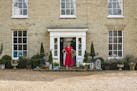 Paula Sutton in front of Hill House, her 19th-century home in Norfolk, England. MUST CREDIT: Simon Brown/Clarkson Potter