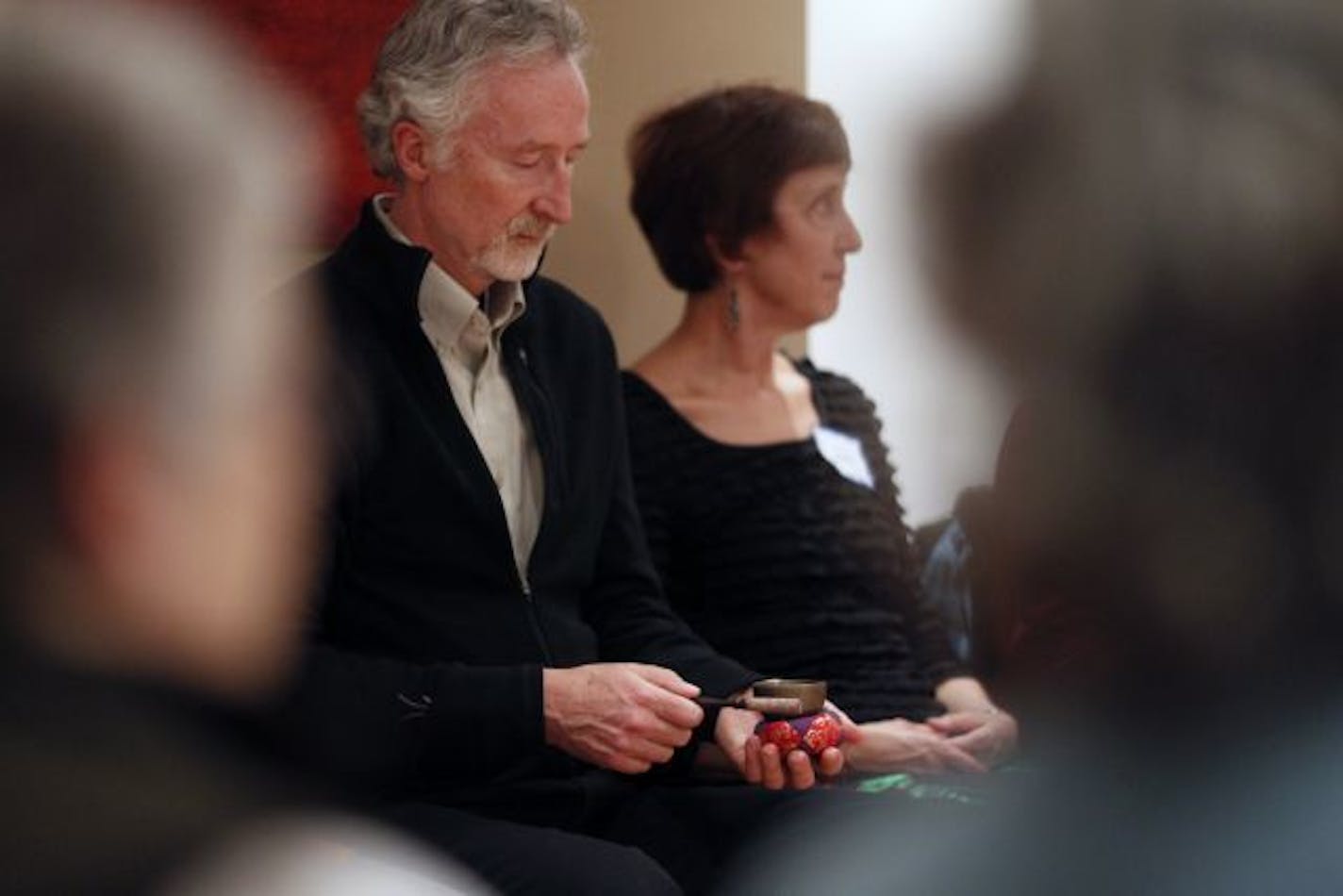 Dr. Henry Emmons begins a group meditation by ringing a bell. He is a Minnesota psychiatrist who doesn't really like talking about depression and anxiety; he prefers to talk about how to bring joy and calm into people's lives.