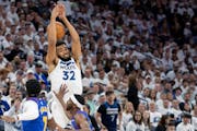 Karl-Anthony Towns can’t bring in a pass at the end of the first quarter of Game 3 at Target Center. It was that kind of night for the Wolves, who w