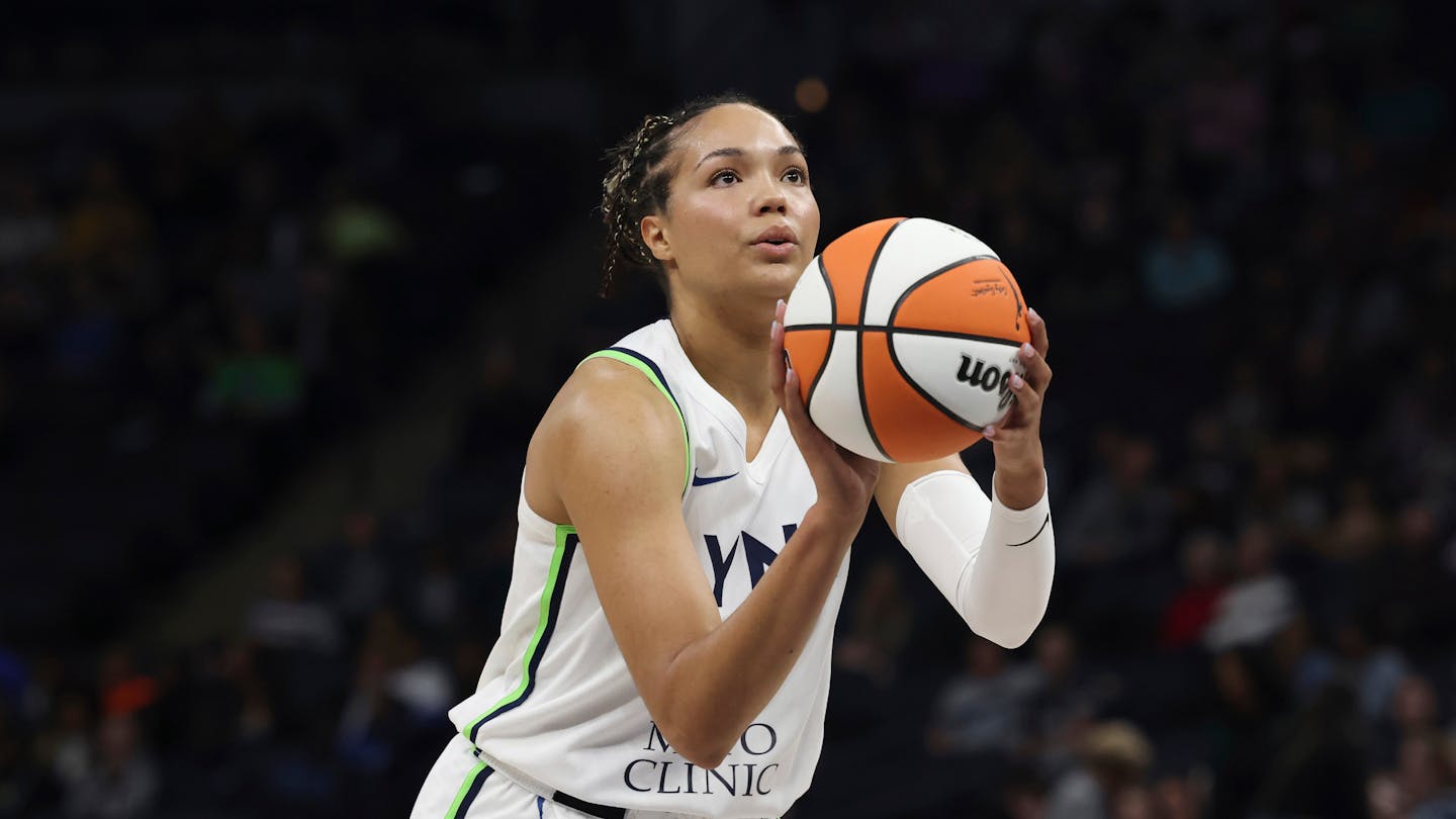 Minnesota Lynx forward Napheesa Collier (24) shoots a free throw during a WNBA basketball game against the Chicago Sky, Friday, May 19, 2023, in Minneapolis. (AP Photo/Stacy Bengs)