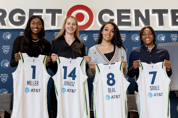Lynx draft picks Diamond Miller, Dorka Juhász, Brea Beal and Taylor Soule posed at Target Center on Thursday.