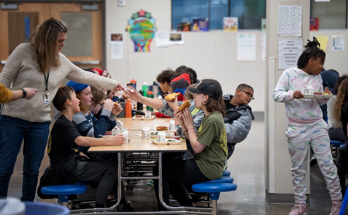 Fifth graders ate school lunch at Champlin-Brooklyn Park Academy Friday, Feb. 17, 2023 Champlin, Minn. ] GLEN STUBBE • glen.stubbe@startribune.com