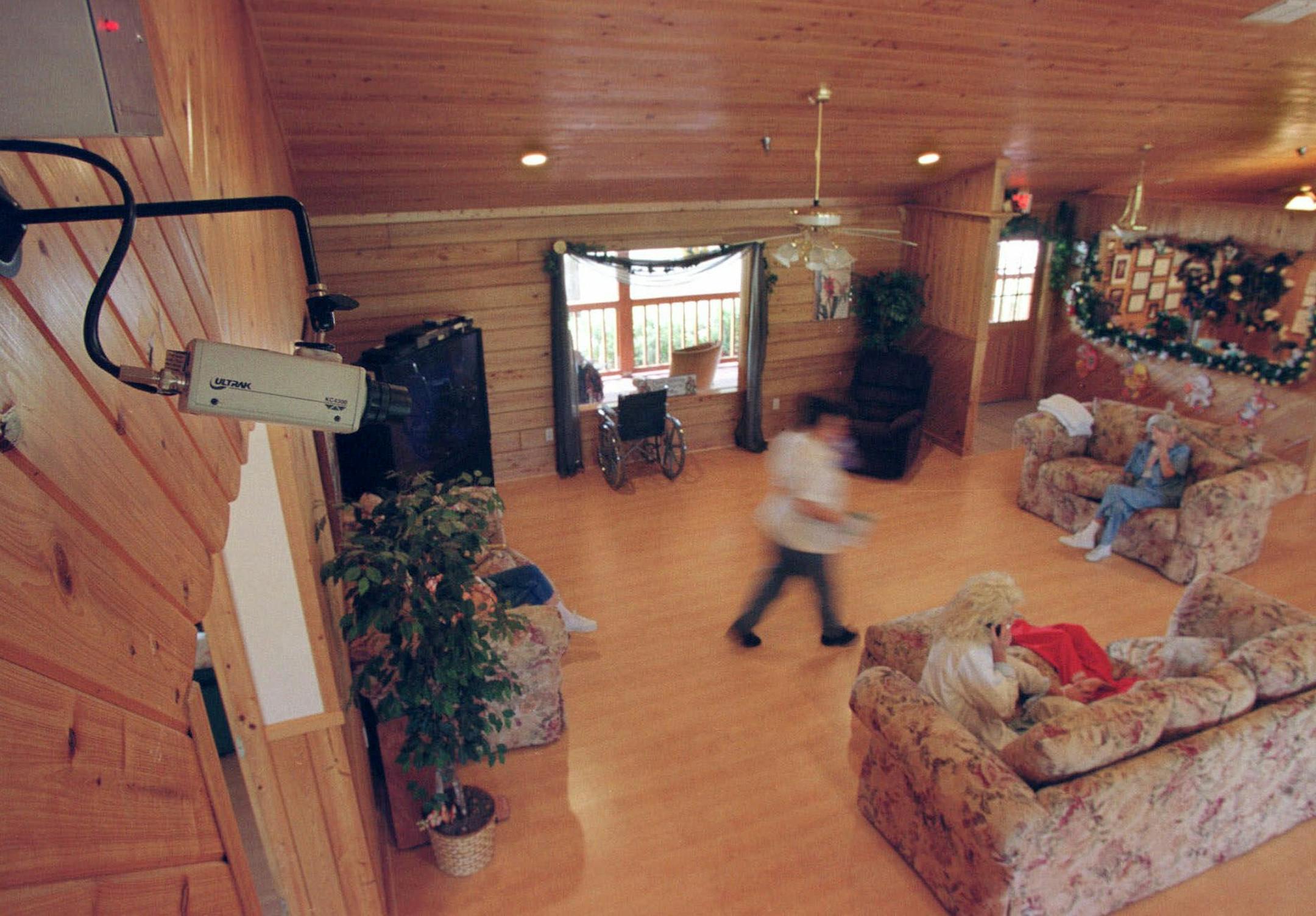 A video camera records the daily activities in the common room of the Southland Suites assisted living community Friday, March 16, 2001, in Lake City, Fla. The nursing home industry has steadfastly opposed so-called "granny cams," but industry critics think surveillance could reduce mistreatment of elderly residents and improve services for them, Tuesday, March 20, 2001. (AP Photo/Oscar Sosa) ORG XMIT: FLOS101