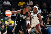 Seattle guard Jewell Loyd, left, leads the WNBA in scoring at 25.4 points per game.