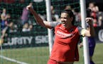 FILE - In this April 15, 2017, file photo, Portland Thorns forward Christine Sinclair celebrates scoring a goal during the second half of their NWSL s
