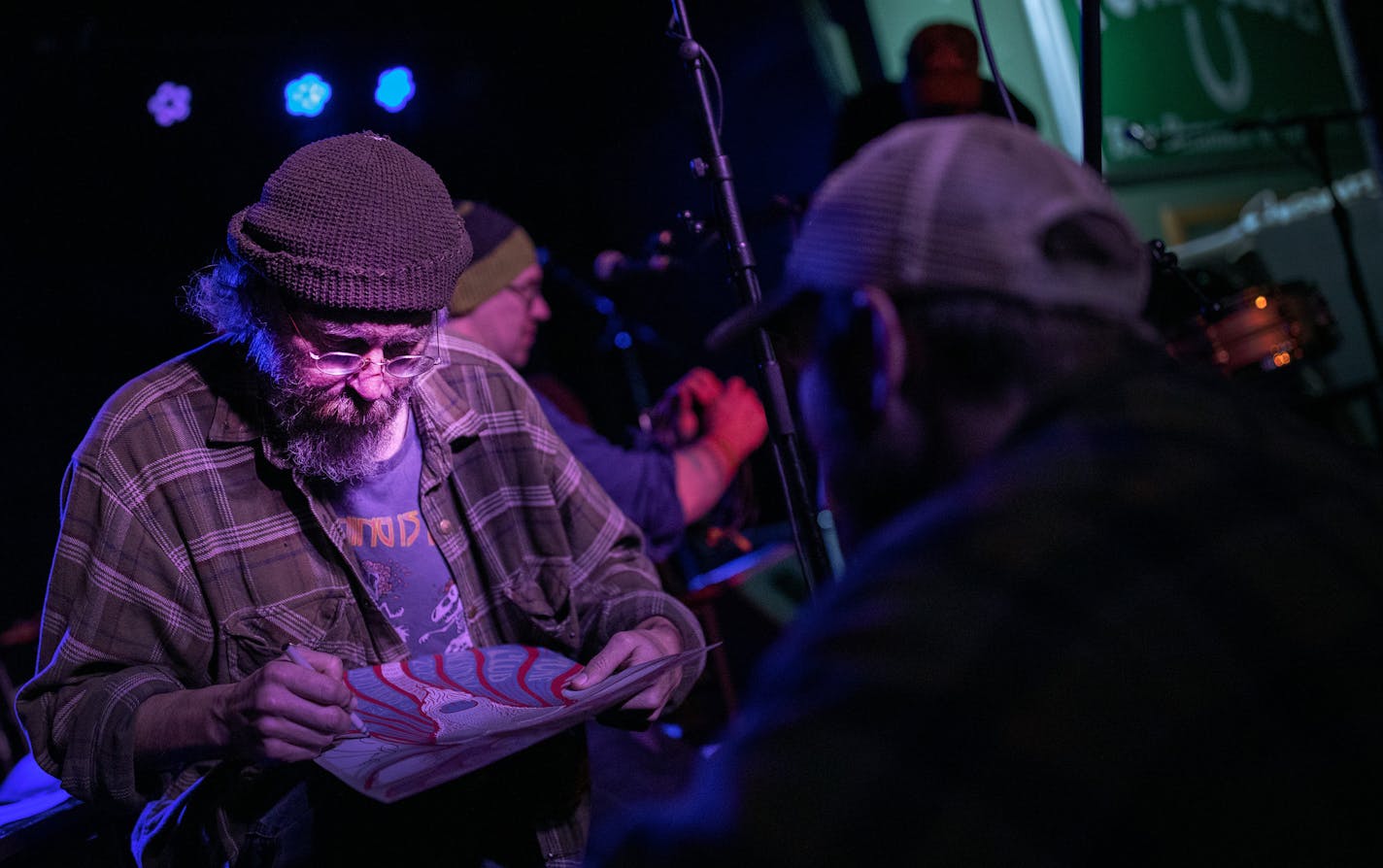 Charlie Parr signed an autograph after a performance at the Turf Club. ] CARLOS GONZALEZ &#x2022; cgonzalez@startribune.com &#x2013; St. Paul, MN &#x2013; January 6, 2020, Turf Club, Two of Minnesota's best-loved roots music acts, Charlie Parr and the Cactus Blossoms, will warm up local music fans in January and stay active themselves with weekly residency gigs at the Turf Club.