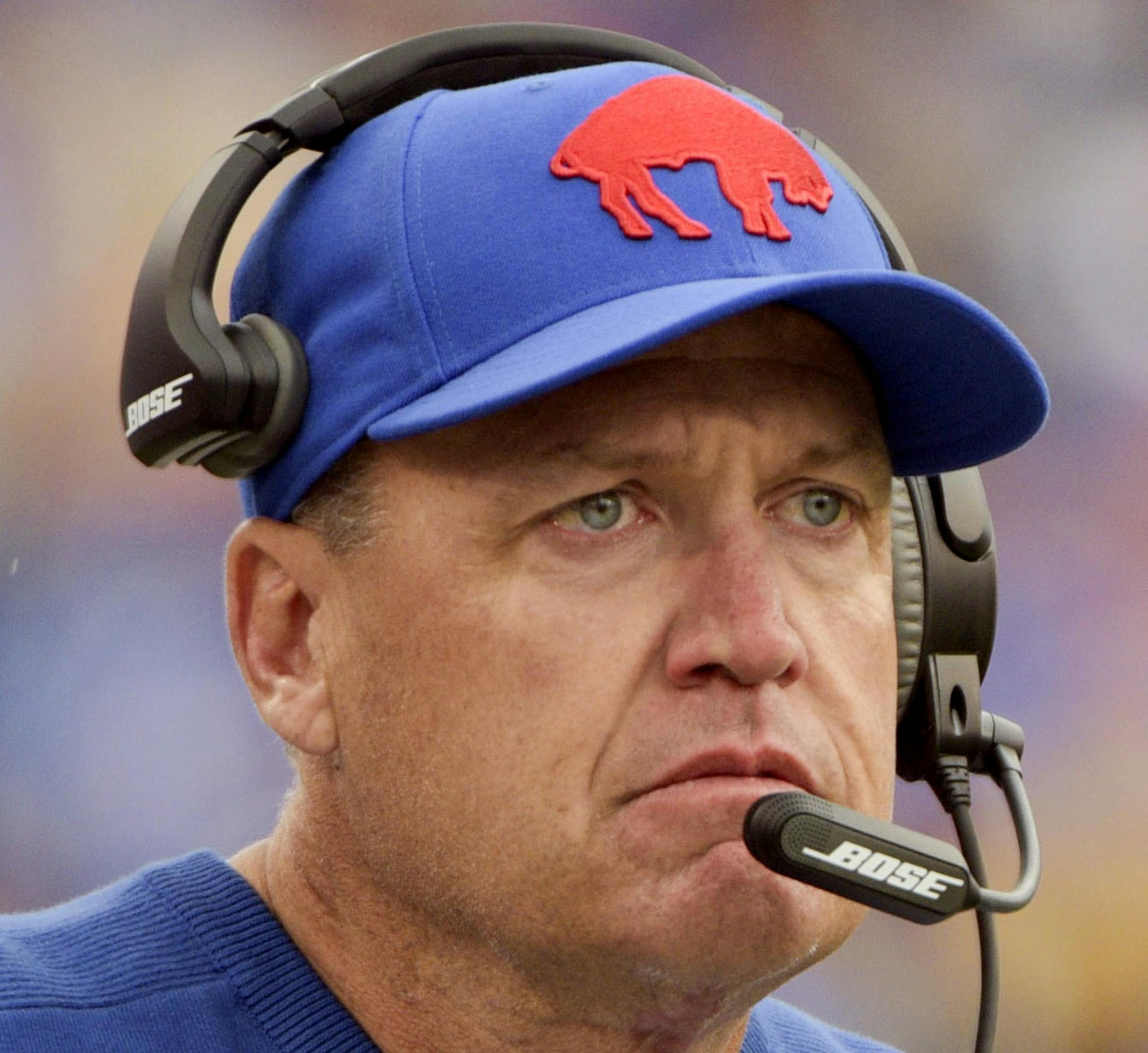 FILE - In this Sept. 13, 2015, file photo, Buffalo Bills coach Rex Ryan stands on the sideline during the first half of an NFL football game against the Indianapolis Colts in Orchard Park, N.Y. (AP Photo/Gary Wiepert, File)