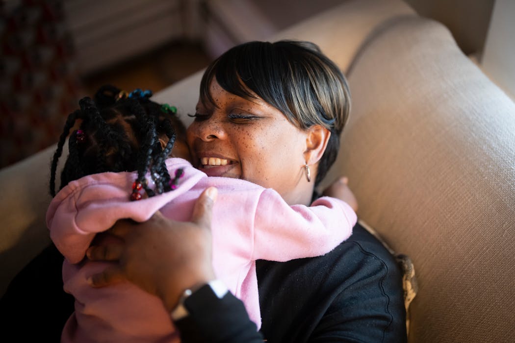 Damara Clark hugged her daughter Amary Lockridge, 3, last week at their home in St. Paul.