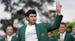 Bubba Watson waves after being presented with his green jacket after winning the Masters golf tournament Sunday, April 13, 2014, in Augusta, Ga. (AP P
