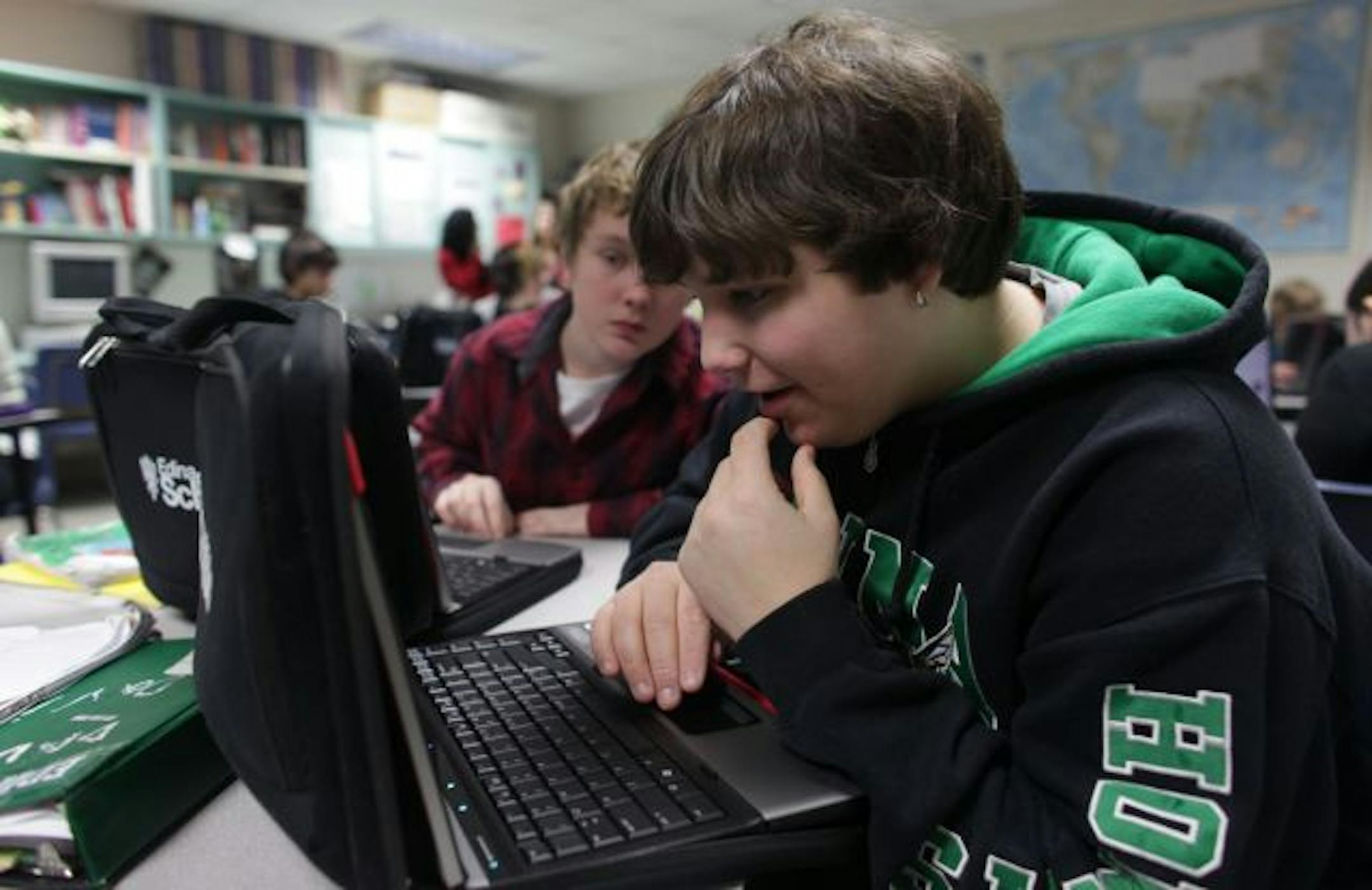 Eighth graders Alex Davis, right, and Matthew Dinger researched anti-semitism in social studies class at South View Middle School.